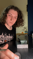 Fingerboard tricks performed on stone block in Yekaterinburg