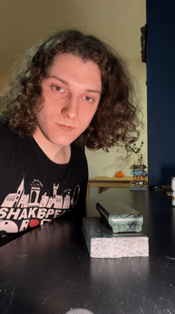 Fingerboard tricks performed on stone block in Yekaterinburg