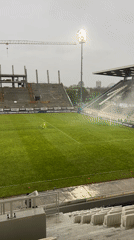 Football match recorded at Lokomotiv Plovdiv stadium under overcast skies
