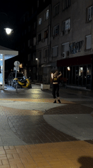 Fire-spinning performance lights up Sofia sidewalk at night
