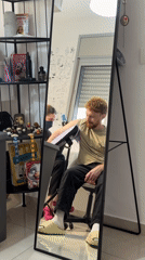 Tattoo session and bathroom selfie documented in Bat Yam