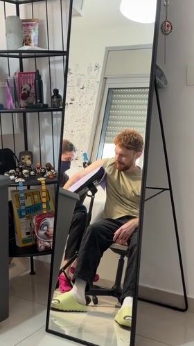 Tattoo session and bathroom selfie documented in Bat Yam