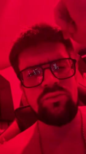 Selfie video under red lighting in Volgograd