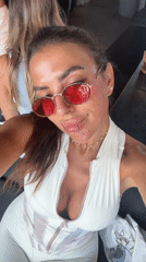Woman in red sunglasses documented dining, selfies in North Kuta