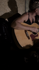 Street musician performs acoustic set in Nha Trang