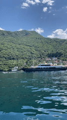 Yacht spotted crossing Montenegro waters as woman enjoys boat trip