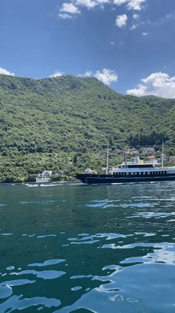 Yacht spotted crossing Montenegro waters as woman enjoys boat trip