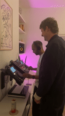 DJ operates Pioneer setup in London room