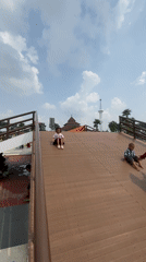 Families enjoy early morning playground time in Sidoarjo park