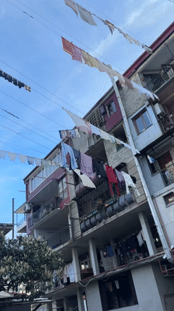 Urban street life captured across residential neighborhood