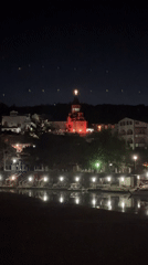Red-lit church with illuminated cross observed in Novomikhaylovsky
