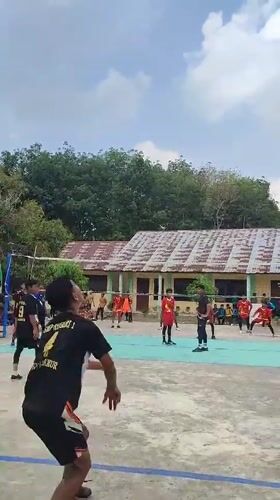 Outdoor volleyball game captured in Blangriek, Indonesia
