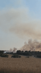 Heavy smoke rises over rural Montmaneu, Spain