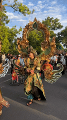 Traditional Balinese parade features elaborate costumes in Denpasar