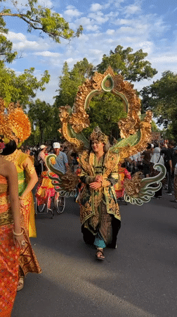 Traditional Balinese parade features elaborate costumes in Denpasar