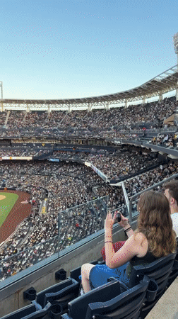 Live baseball in San Diego with a full stadium and city skyline