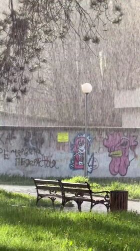 Rainy afternoon scenes captured across Velingrad park walkways