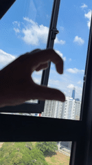 Hotel day in KL: candy hearts, skyline views, city streets below