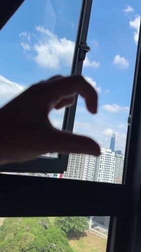 Hotel day in KL: candy hearts, skyline views, city streets below