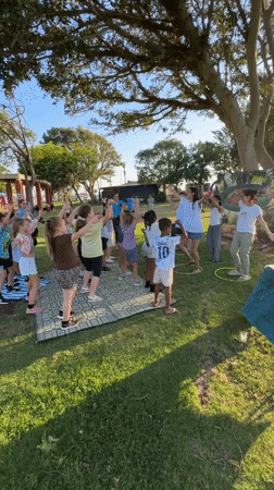 Outdoor kids' event in Netanya with games and a golden retriever