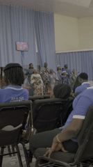 Ten-person choir performs on church hall stage