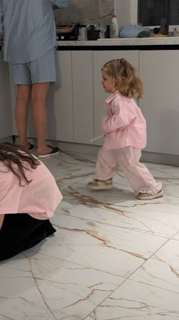 Family moments captured during evening activities in Russian home