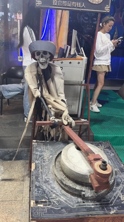 Horror attraction in Chongqing with zombie figures and spooky props