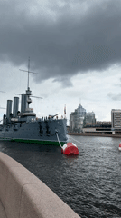 Tourists visit historic Cruiser Aurora museum ship in Saint Petersburg