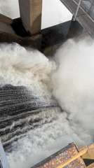 Dam releases water through spillway in Volzhsky, Russia