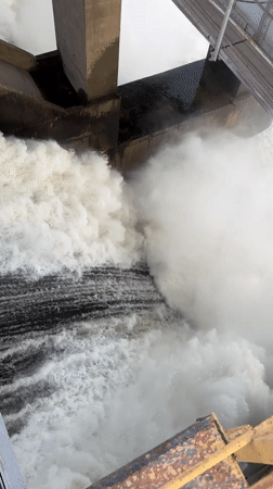 Dam releases water through spillway in Volzhsky, Russia