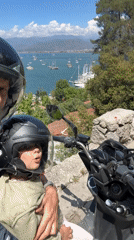 Father-child motorcycle tour captures scenic Fethiye Bay moments