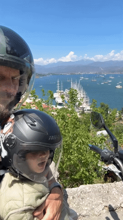 Father-child motorcycle tour captures scenic Fethiye Bay moments