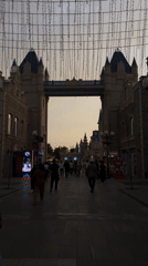 Evening crowds gather at illuminated entertainment complex in Tashkent
