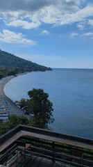 Morning coastal view recorded from wooden deck in Abang