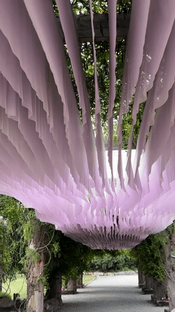 Ornamental garden space with fabric canopy and lion waterfall