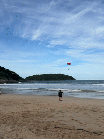 Late-night paragliding and beach activities documented in Rawai, Thailand