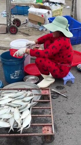 Morning street market activity in Nha Trang, Vietnam