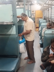 Night halt at Rayavara station, street food sold aboard train