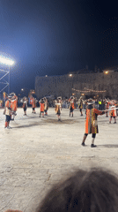 Children perform traditional dance in period costumes in Budva