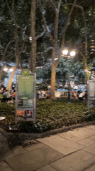 Dusk settles over a busy New York park