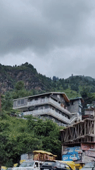Cloudy morning in Palchan's mountain village, road and riverbed