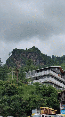 Cloudy morning in Palchan's mountain village, road and riverbed