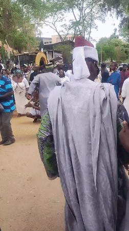 Community gathering with traditional dancing in Jos, Nigeria
