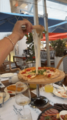 Lunch spread at an outdoor Batumi restaurant with Black Sea views
