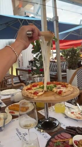 Lunch spread at an outdoor Batumi restaurant with Black Sea views