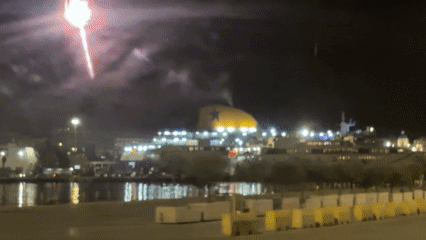 Nighttime ferry operations documented at Piraeus harbor Greece