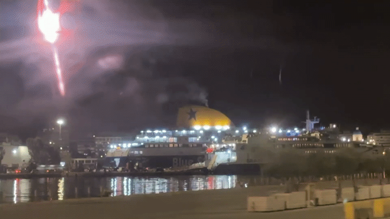 Nighttime ferry operations documented at Piraeus harbor Greece