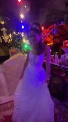 Bride dances at wedding celebration in Thailand