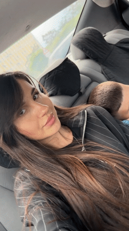 Mother and child document car journey in Yerevan traffic
