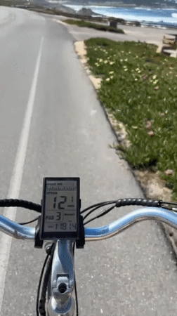 E-bike rider cruises coastal path in Del Monte Forest